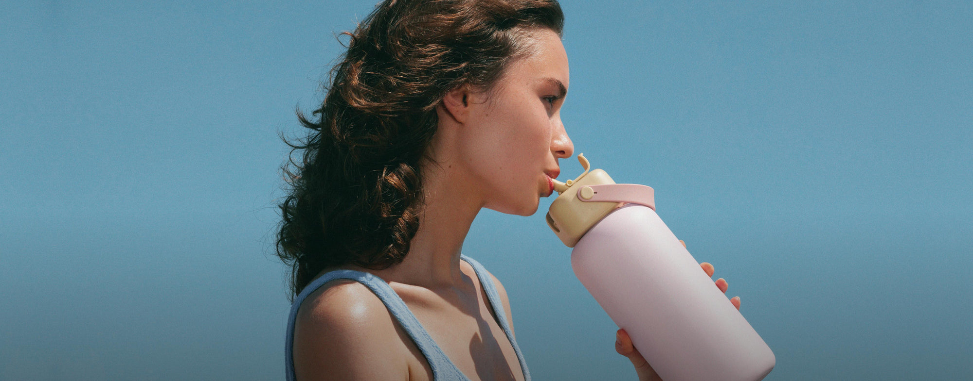 Discover the Sunnies Studios Summer Collection — colorful insulated water bottles with straps, caps, and accessories designed for outdoor days and everyday hydration.